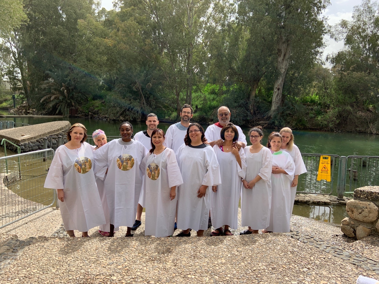Our team being Baptized at the River Jordan