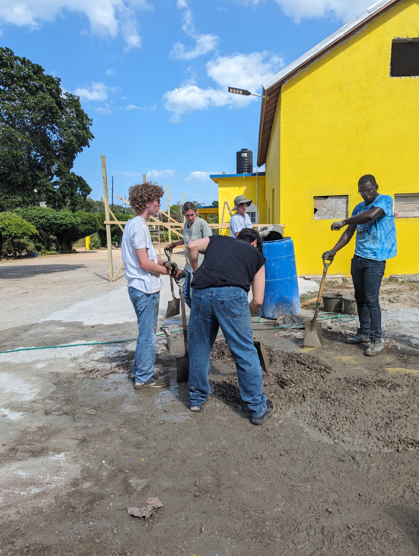 Hard Work Preparing Concrete for the Baptistry Floor