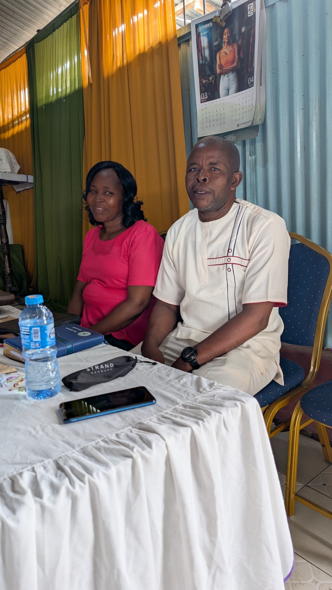 Ambrose and his wife at their church