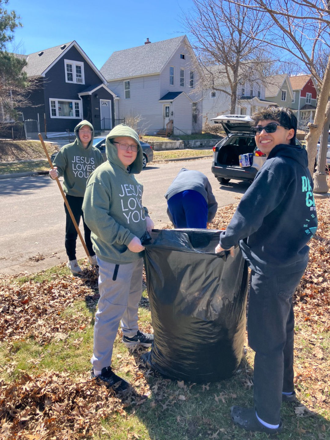 Raking and Gardening at a Community Garden