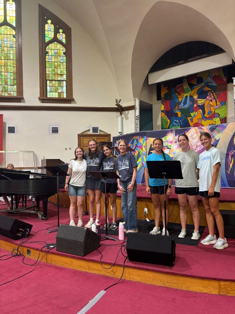 Leading worship and serving breakfast!